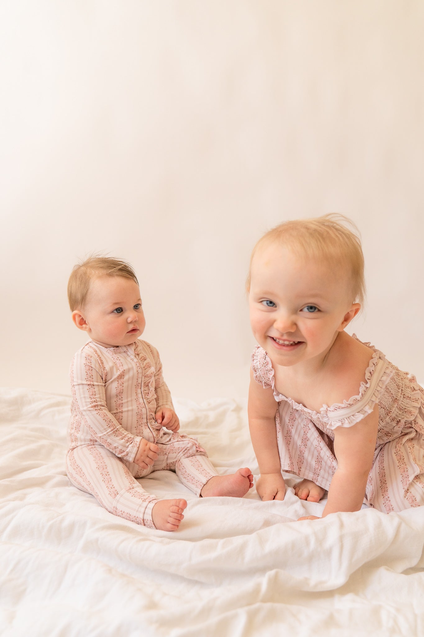 Rosy Reverie Ruffles Zip Romper Onesie