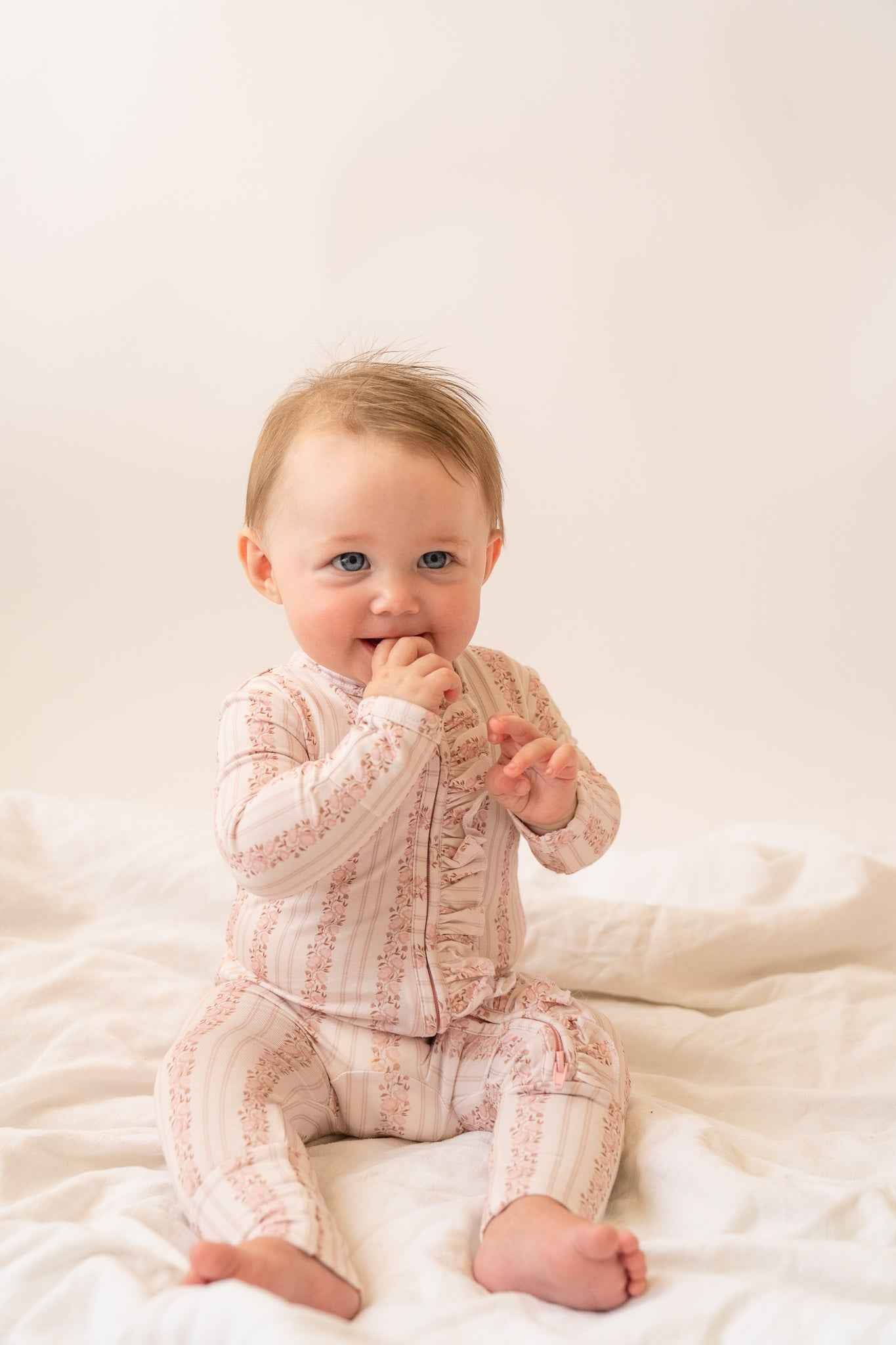 Rosy Reverie Ruffles Zip Romper Onesie - little nessi