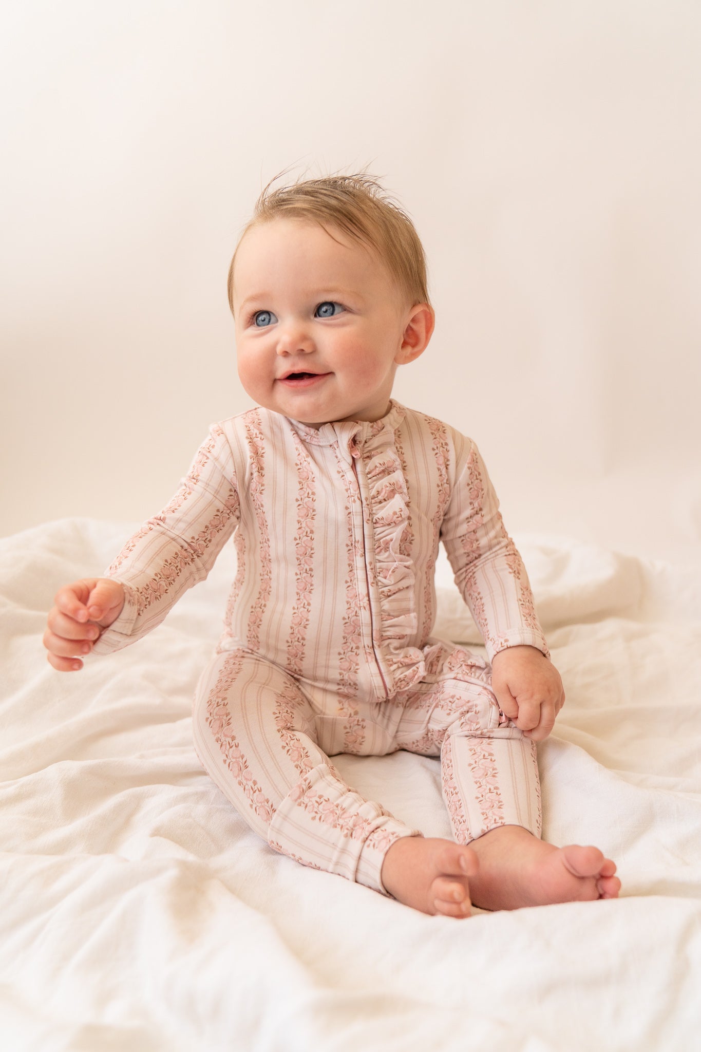 Ruffles Zip Romper Onesie | Rosy Reverie